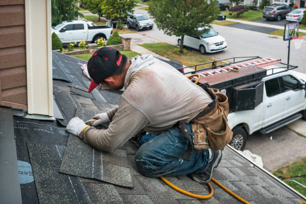 Professional Roofing technician working in Mooreton, ND
